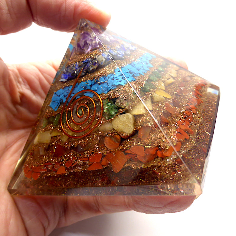 Orgonite Pyramid with genuine Chakra Stones | Clear Crystal Point conduit in Copper Spiral | Accumulate Orgone Energy | Balance and Energise whole system | Red Jasper, Carnelian, Golden Quartz, Emerald, Turquoise, Lapis Lazuli and Amethyst | Crystal Heart Melbourne Australia since 1986