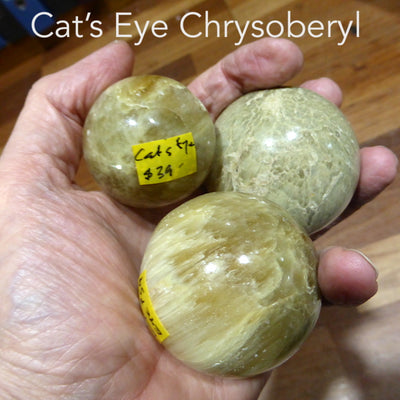 Cat's Eye Chrysoberyl Crystal Sphere | Protection | Deep Thought | Positive | Calm | Genuine Gems from Crystal Heart Melbourne Australia since 1986