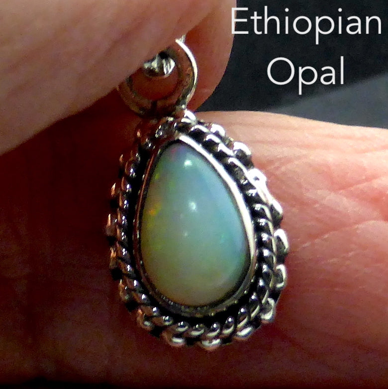 Ethiopian Solid Opal Pendant | Small Teardrop Cabochon | Green & Red Flash | 925 Silver | Bezel Setting with 3 layers of ornamentation surrounding | Open Back | Genuine Gems from Crystal Heart Australia since 1986